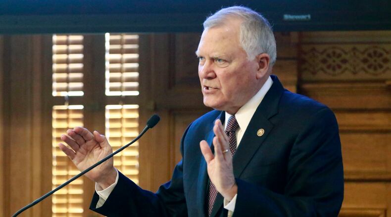 Gov. Nathan Deal addresses the joint House and Senate budget committees today. Deal and the state's chief fiscal economist opened a week of legislative budget hearings Tuesday by presenting Georgia's economic outlook for the next year. BOB ANDRES / BANDRES@AJC.COM
