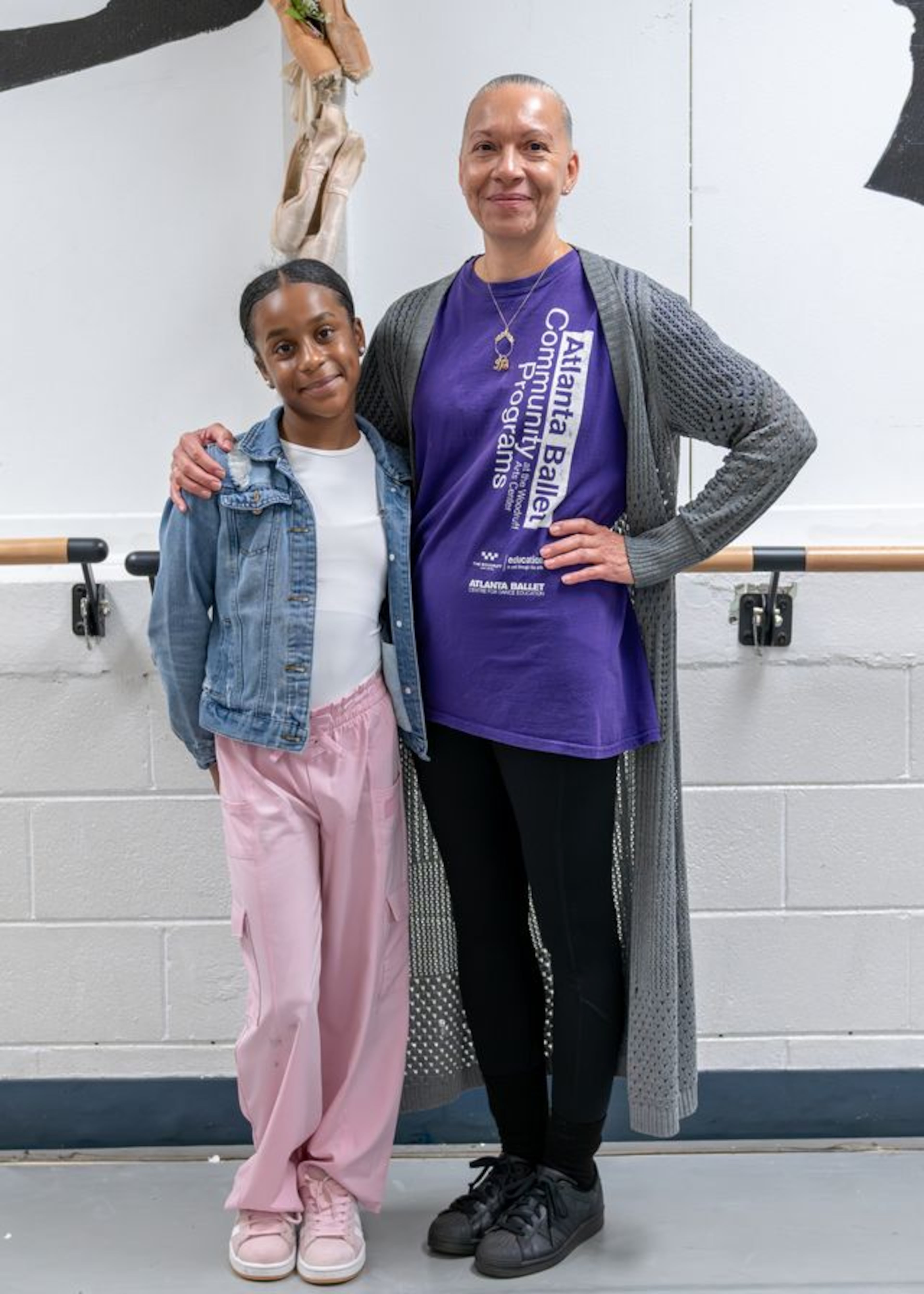 Skylar Dodson with one of her instructors, Diane Caroll, who oversees the Atlanta Ballet Centre for Dance Education’s community engagement programs. (Courtesy of Amber Times)