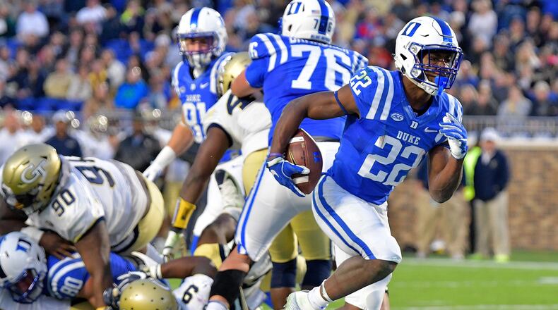 DURHAM, NC - NOVEMBER 18: Brittain Brown #22 of the Duke Blue Devils scores a touchdown against the Georgia Tech Yellow Jackets during their game at Wallace Wade Stadium on November 18, 2017 in Durham, North Carolina. (Photo by Grant Halverson/Getty Images)