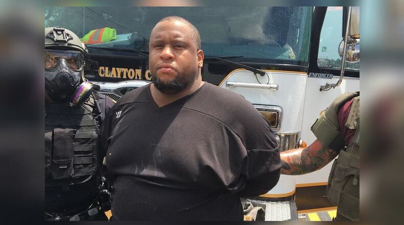 Timothy Monroe was taken into custody after a standoff at a Clayton County hotel. (Credit: Clayton County Police Department)
