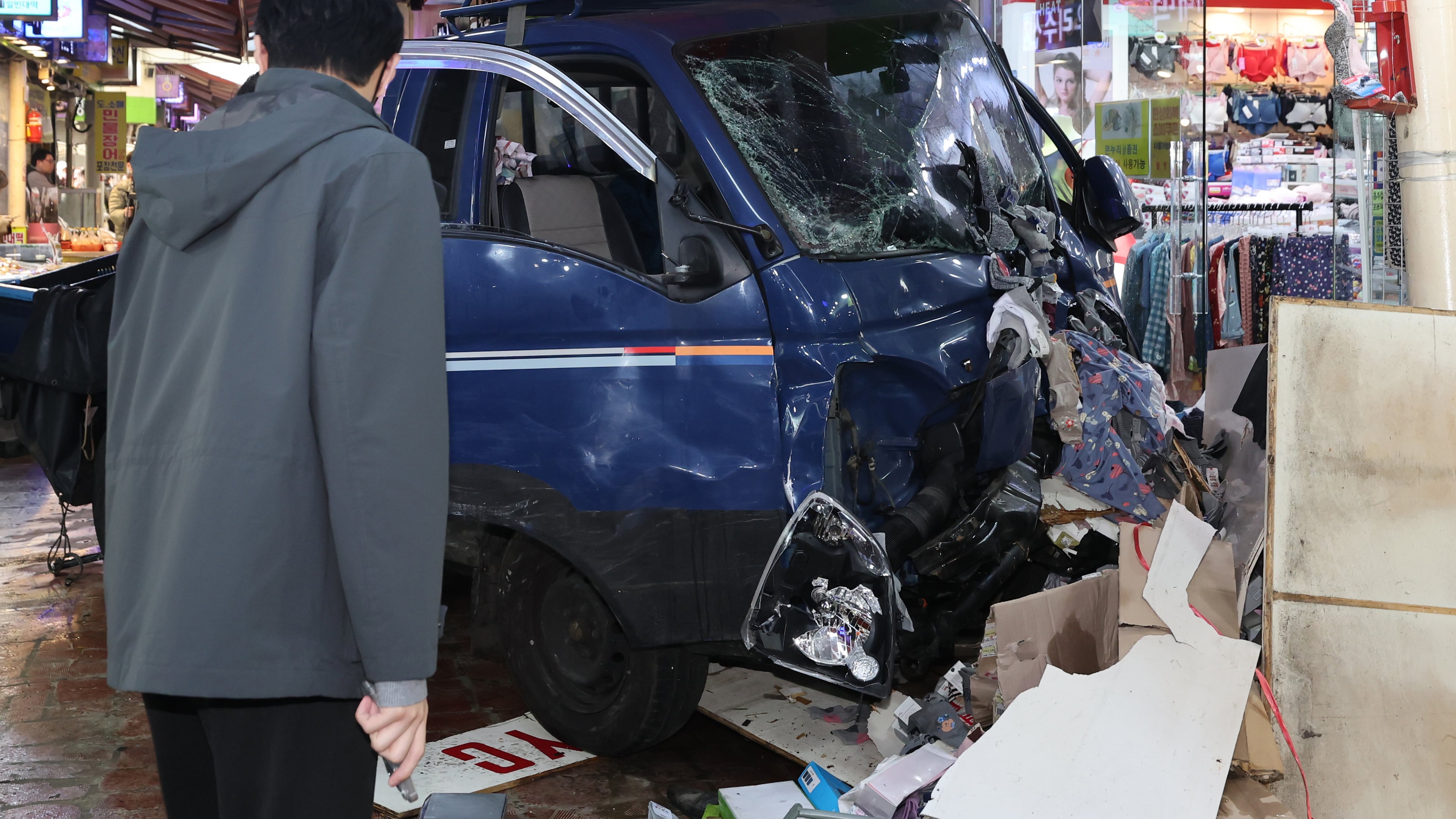 A truck crashes at a market in Bucheon, South Korea, Thursday, Nov. 13, 2025. (Lim Soon-suck/Yonhap via AP)