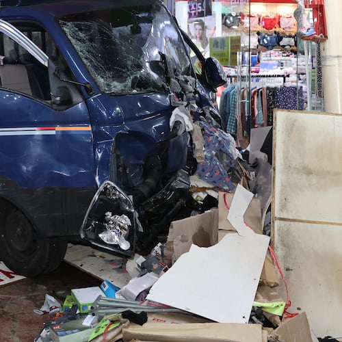 A truck crashes at a market in Bucheon, South Korea, Thursday, Nov. 13, 2025. (Lim Soon-suck/Yonhap via AP)
