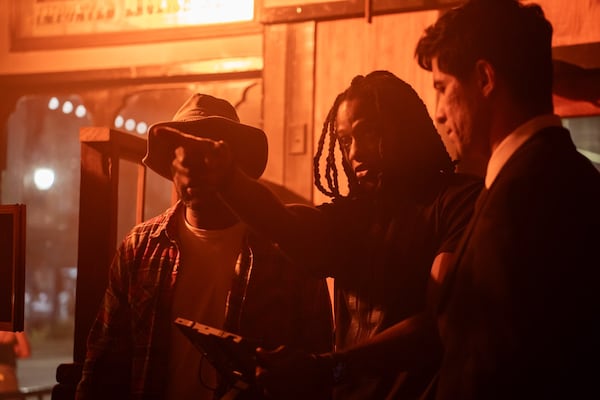 Former Georgia wide receiver Chris Conley (middle) stands on the set of “History,” a short film that Conley wrote, directed and produced as a student this semester at the University of Georgia film school. (Courtesy of Rhett Morgan)
