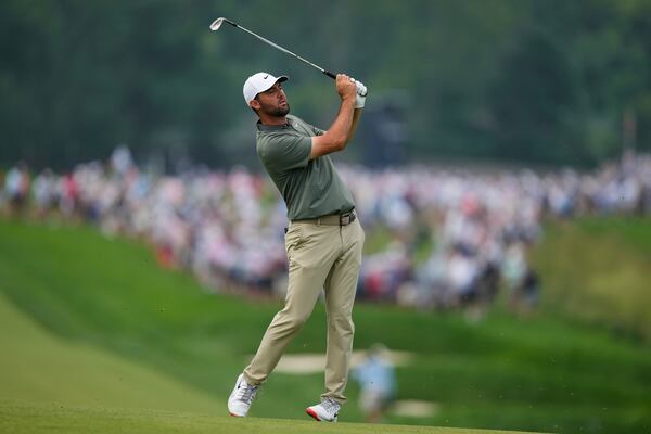 Scottie Scheffler plays on the third hole during the second round of the U.S. Open golf tournament at Oakmont Country Club Friday, June 13, 2025, in Oakmont, Pa. (AP Photo/Charlie Riedel)
