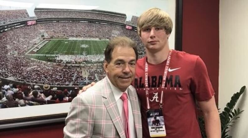 Cane Berrong and Alabama head coach Nick Saban.