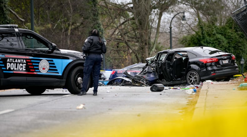Atlanta police investigate a fatal wreck on Martin Luther King Jr. Drive in southwest Atlanta on Monday.