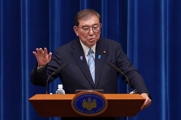 Japan's Prime Minister Shigeru Ishiba speaks during a press conference at his office in Tokyo Tuesday, April 1, 2025. (Nicolas Datiche/Pool Photo via AP)