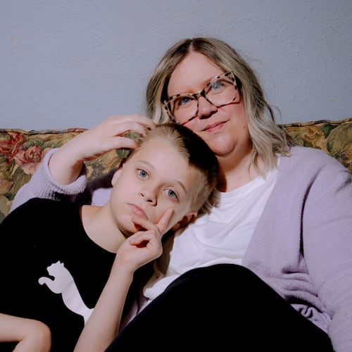 Lindsey Althaus and her son, Whitman Althaus, 12, who has autism and a neurological disorder called apraxia, pose for a portrait at their home Wednesday, July 1, 2026, in Luckey, Ohio. (AP Photo/Nic Antaya)