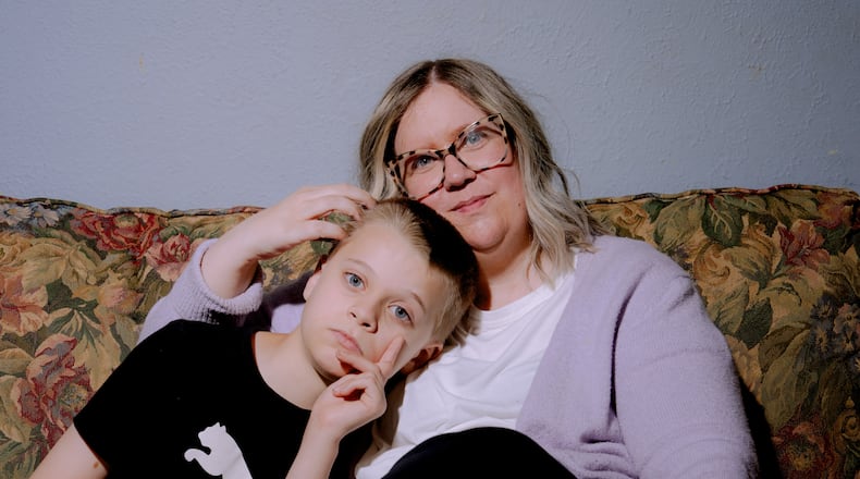Lindsey Althaus and her son, Whitman Althaus, 12, who has autism and a neurological disorder called apraxia, pose for a portrait at their home Wednesday, July 1, 2026, in Luckey, Ohio. (AP Photo/Nic Antaya)