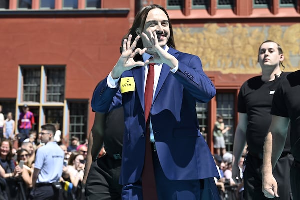 Estonia's Tommy Cash poses for a photo, during the opening ceremony of the 69th Eurovision Song Contest, in Basel, Switzerland, Sunday, May 11, 2025. (Peter Schneider/Keystone via AP)