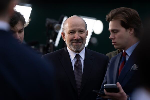Commerce Secretary Howard Lutnick leaves after doing a television interview outside the White House, Wednesday, April 2, 2025, in Washington. (AP Photo/Mark Schiefelbein)