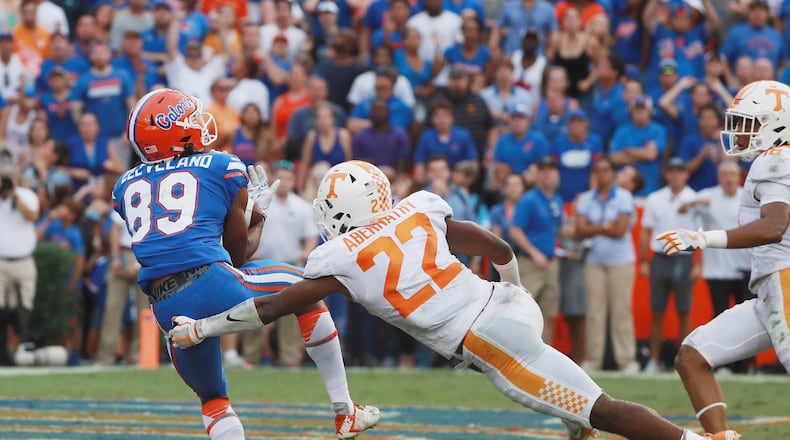 Florida's Tyrie Cleveland hauls in a 63-yard touchdown as time expires to give the Gators 26-20 win over Tennessee at Florida's Ben Hill Griffin Stadium in Gainesville. Tennessee's Micah Abernathy was the defender beaten on the Hail Mary play. (Scott Halleran/Getty Images)