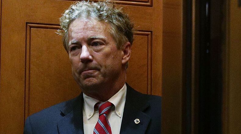 U.S. Sen. Rand Paul (R-KY) takes the elevator as he arrives at the Capitol for a vote November 13, 2017 in Washington, DC. Sen. Paul returned to Capitol Hill after he was attacked by his neighbor Rene Boucher and broke six of his ribs while mowing the lawn at his Kentucky home on November 3. (Photo by Alex Wong/Getty Images)
