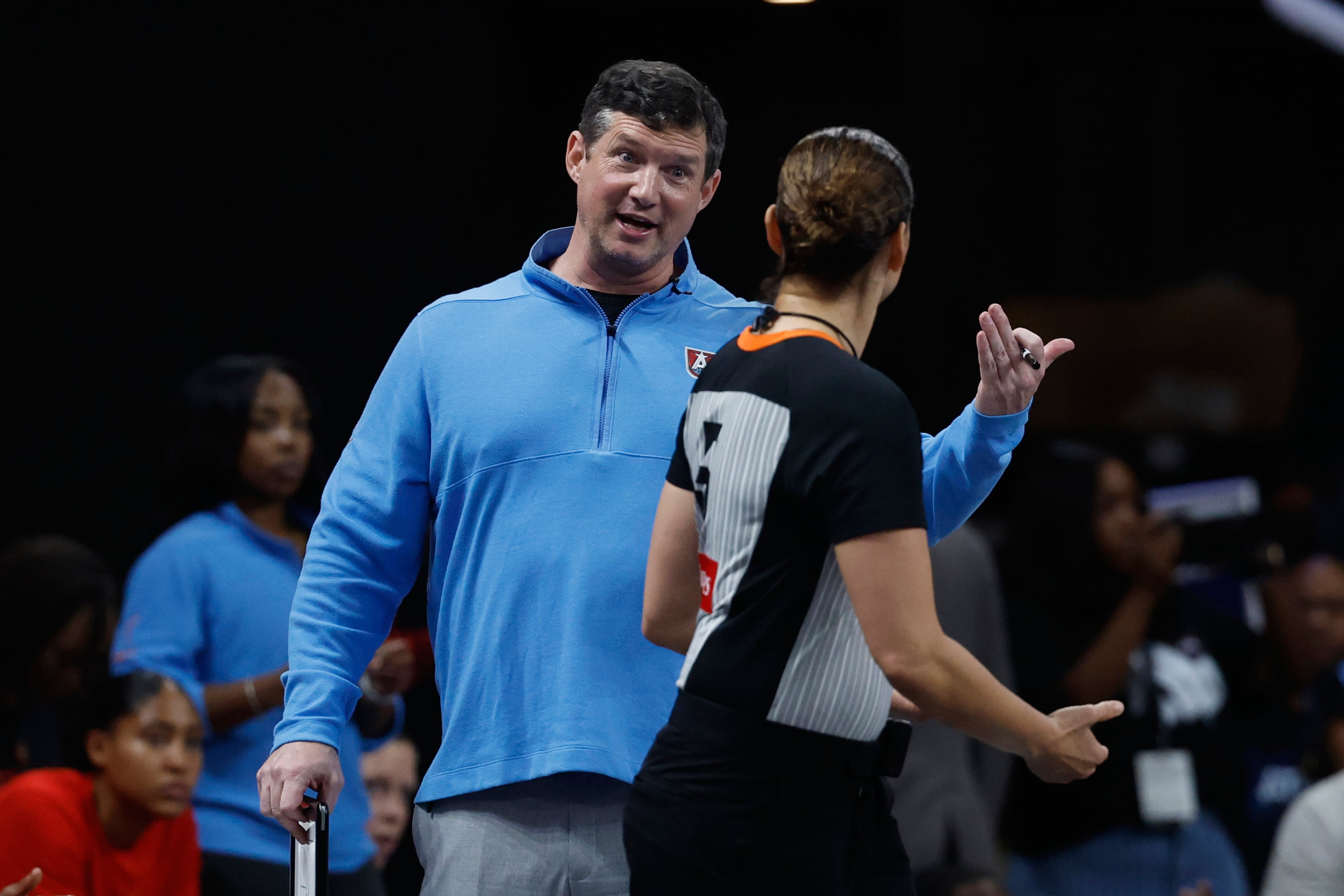 Atlanta Dream head coach Karl Smesko, center left, reacts after a call during the second half of Game 3 against the Indiana Fever in the first round of the WNBA basketball playoffs Thursday, Sept. 18, 2025, in Atlanta. (AP Photo/Butch Dill)