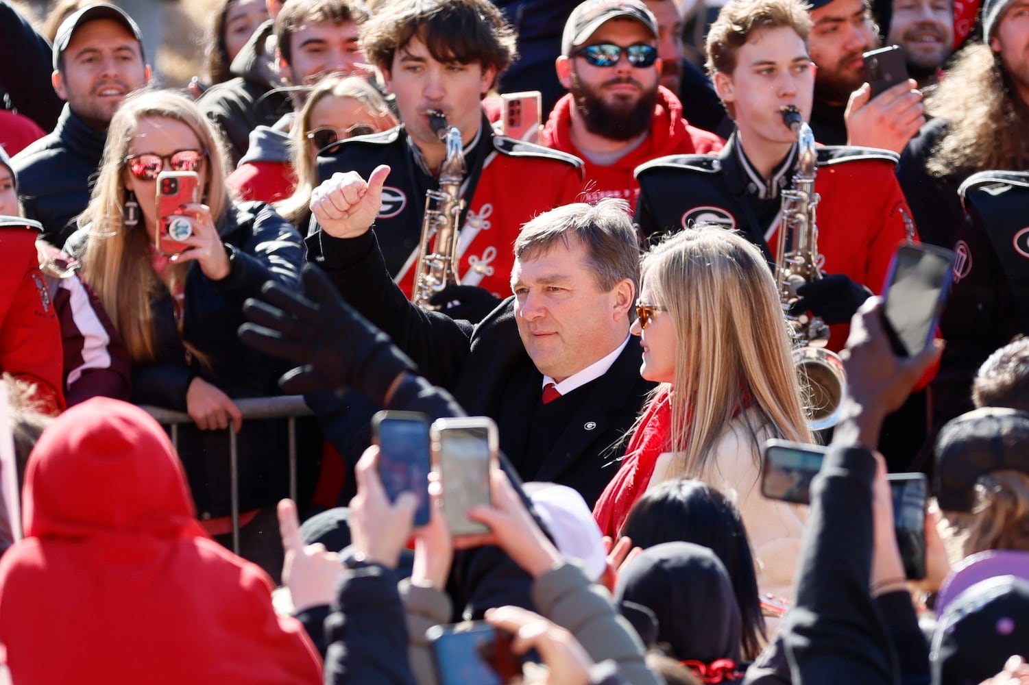 Georgia head coach Kirby Smart gives a thumbs up to the fans as he walks through the Dawg Walk.  Miguel Martinez / miguel.martinezjimenez@ajc.com