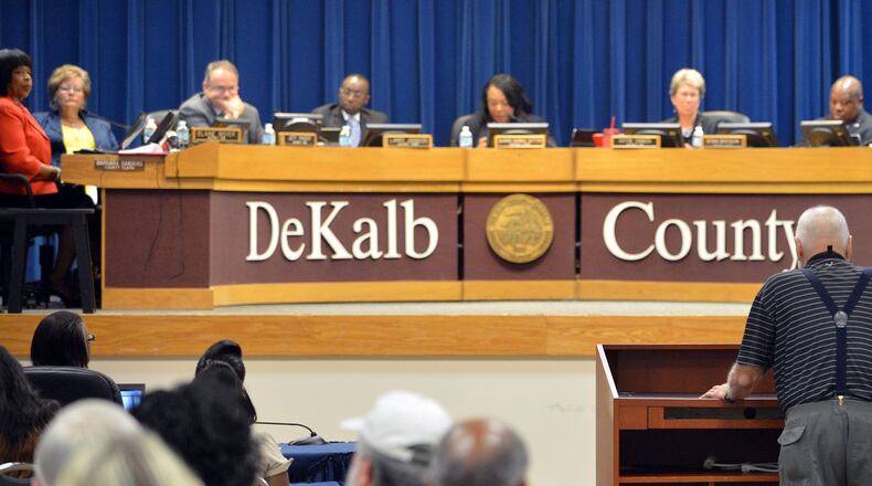 A citizen speaks at a DeKalb County Board of Commissioners meeting.