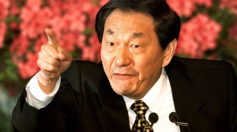 FILE - Chinese Premier Zhu Rongji speaks during a news conference in Beijing, Wednesday, March 15, 2000. (AP Photo/Greg Baker, File)
