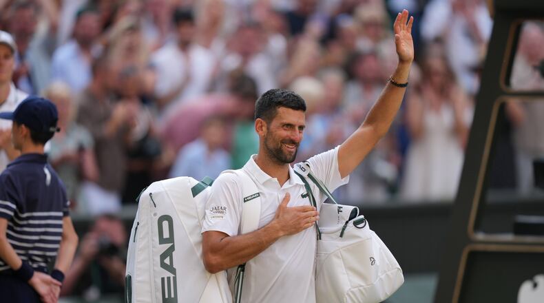 Novak Djokovic of Serbia leaves after losing to Jannik Sinner of Italy in their men's singles semifinal match at the Wimbledon Tennis Championships in London, Friday, July 10, 2026. (AP Photo/Kin Cheung)