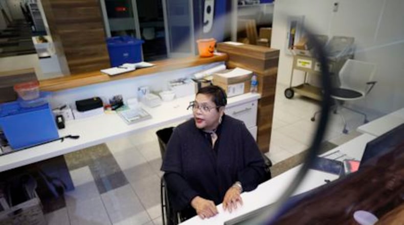 Lisa Smith is administrative coordinator at Goodwill. She was badly injured in a car crash, but needed an income to support herself and her children. WIth a little bit of help, she rejoined the workforce.