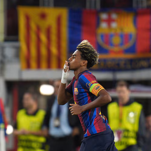 Barcelona's Lamine Yamal celebrates after scoring his side's fourth goal during the Champions League opening phase soccer between Barcelona and Feyenoord in Barcelona, Spain, Wednesday, Sept. 9, 2026.(AP Photo/Emilio Morenatti)