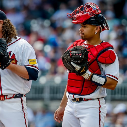 Atlanta Braves catcher Drake Baldwin (right) meets with pitcher Grant Holmes (left) during the second inning of a baseball game against the Philadelphia Phillies, Sunday, Sept. 13, 2026, in Atlanta. (Erik S. Lesser/AP)