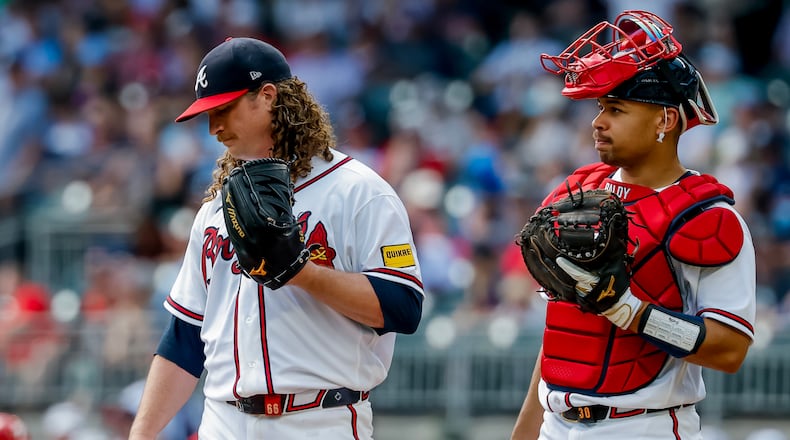 Atlanta Braves catcher Drake Baldwin (right) meets with pitcher Grant Holmes (left) during the second inning of a baseball game against the Philadelphia Phillies, Sunday, Sept. 13, 2026, in Atlanta. (Erik S. Lesser/AP)
