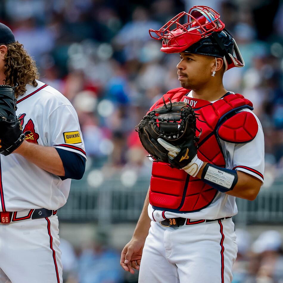 Atlanta Braves catcher Drake Baldwin (right) meets with pitcher Grant Holmes (left) during the second inning of a baseball game against the Philadelphia Phillies, Sunday, Sept. 13, 2026, in Atlanta. (Erik S. Lesser/AP)