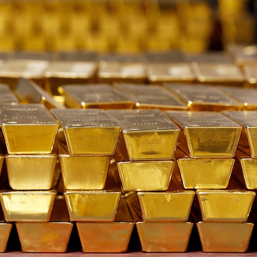 FILE - Gold bars are stacked in a vault at the United States Mint on July 22, 2014, in West Point, N.Y. (AP Photo/Mike Groll, File)