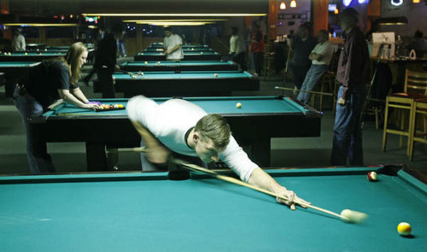 Pool hall offers solace in tough times