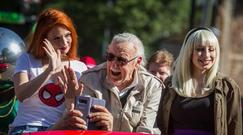 Dragon Con's Grand Marshal Stan Lee waves to the crowd as he makes his way up Peachtree Street during the Dragon Con parade Saturday, September 2, 2017. Lee was formerly editor-in-chief of Marvel Comics. STEVE SCHAEFER / SPECIAL TO THE AJC