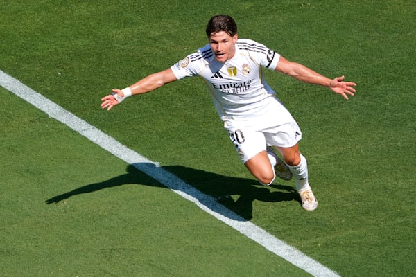 Real Madrid's Fran Garcia celebrates scoring his side's 2nd goal during the Club World Cup quarterfinal soccer match between Real Madrid and Borussia Dortmund in East Rutherford, N.J., Saturday, July 5, 2025. (AP Photo/Pamela Smith)