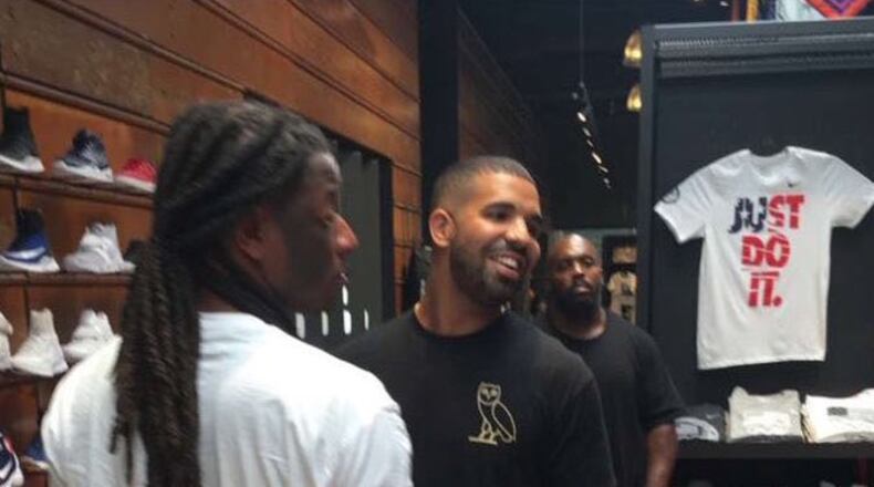 Somebody tweeted their snap about Drake at Lenox. We applaud that sort of multitasking. Just do it, indeed!