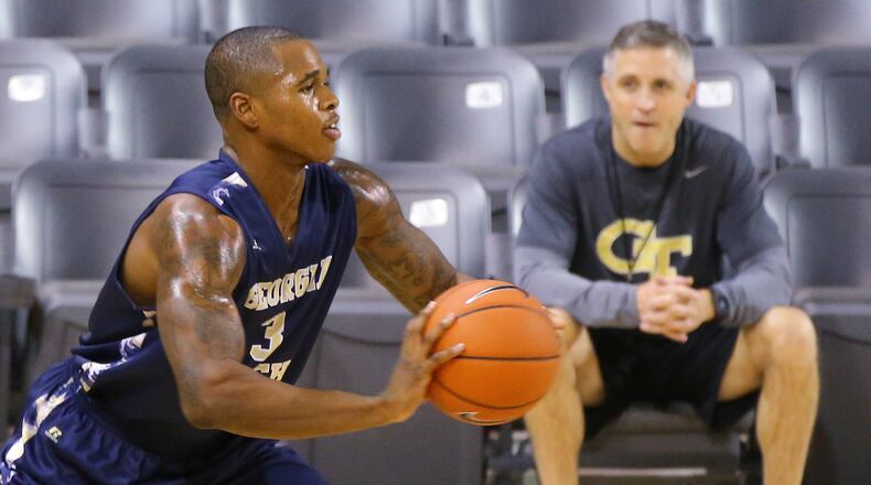 092815 ATLANTA: Georgia Tech Marcus Georges-Hunt gets off a pass with head coach Brian Gregory looking on during the team's annual Media Day at McCamish Pavilion on Monday, Sept. 28, 2015, in Atlanta. Curtis Compton / ccompton@ajc.com