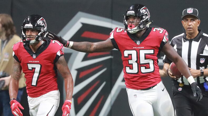 August 30, 2018 Atlanta: Atlanta Falcons running back Malik Williams (right) celebrates his touchdown agianst the Miami Dolphins with Devin Gray during the first half in a NFL preseason game on Thursday, August 30, 2018, in Atlanta.  Curtis Compton/ccompton@ajc.com