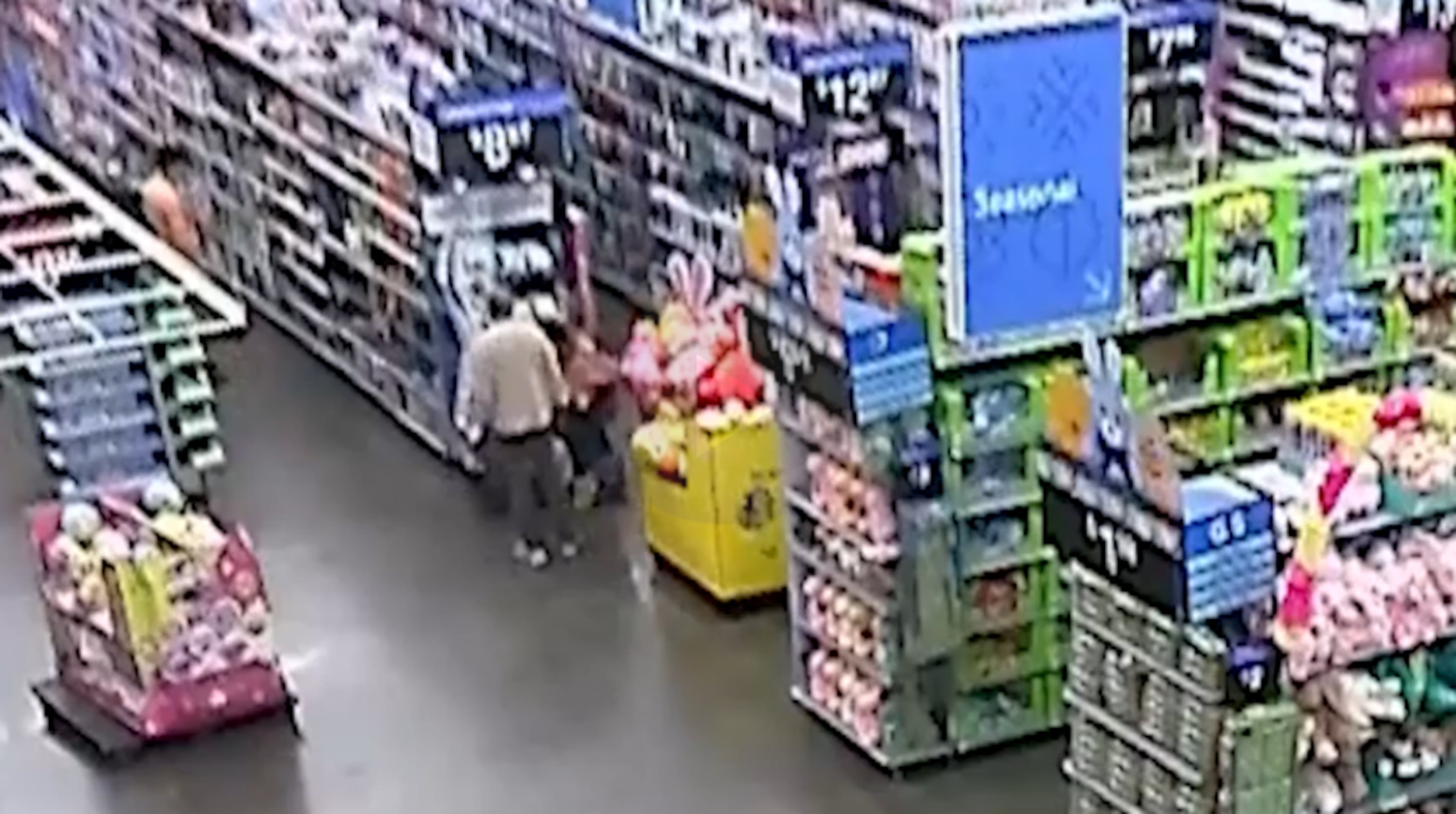 Surveillance footage from an Acworth Walmart shows Mahendra Patel interacting with another shopper who later accused him of trying to snatch her son. His attorney says the video contradicts the police department's version of events. (Courtesy)