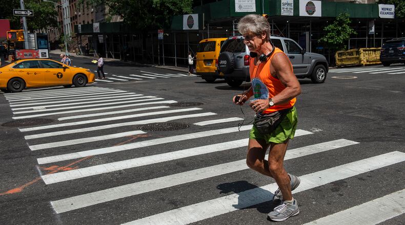 Tom McGrath, owner of the Black Sheep pub, runs in New York. After years of long-distance running and a tenacious battle with alcohol, the pub owner, who has been called the “Irish Forrest Gump,” heeds a last call: a final 100-mile run through Ireland. Monique Jaques/The New York Times