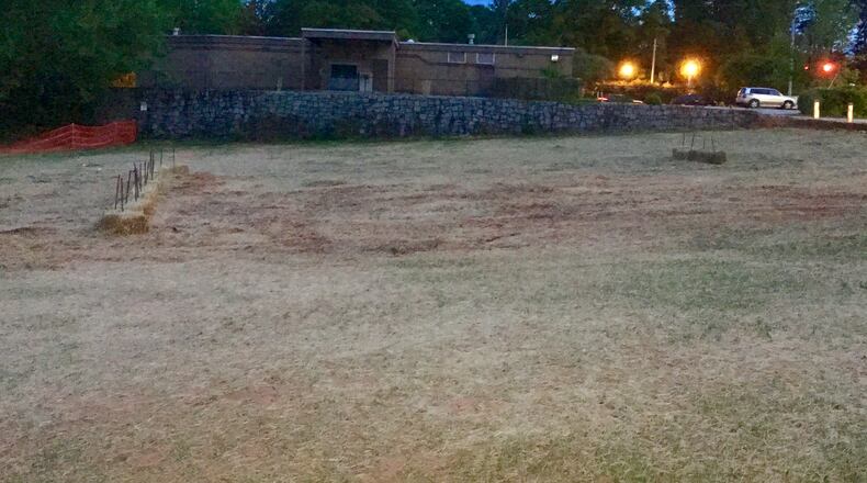 This is the roughly 2.5 acres behind the abandoned Peachtree Credit Union Bank in Avondale Estates that has been cleared by developer Trammell Crow.The city hopes this area will one day become a “town green” and centerpiece of downtown. Bill Banks for the AJC