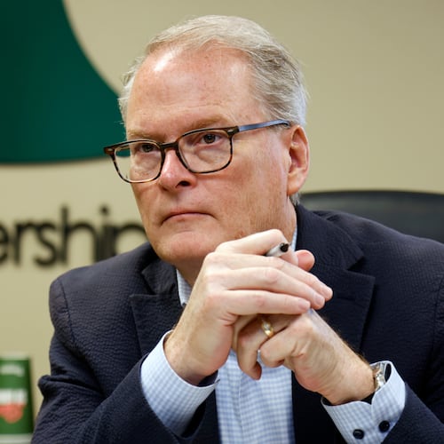 FILE - Democratic U.S. senatorial candidate Adam Hamilton of Kansas, listens to administrators at the Health Partnership Clinic as they discuss funding issues the low-income family medical facility is facing on Wednesday, Aug. 12, 2026, in Olathe. Kan. (AP Photo/Colin E. Braley, File)