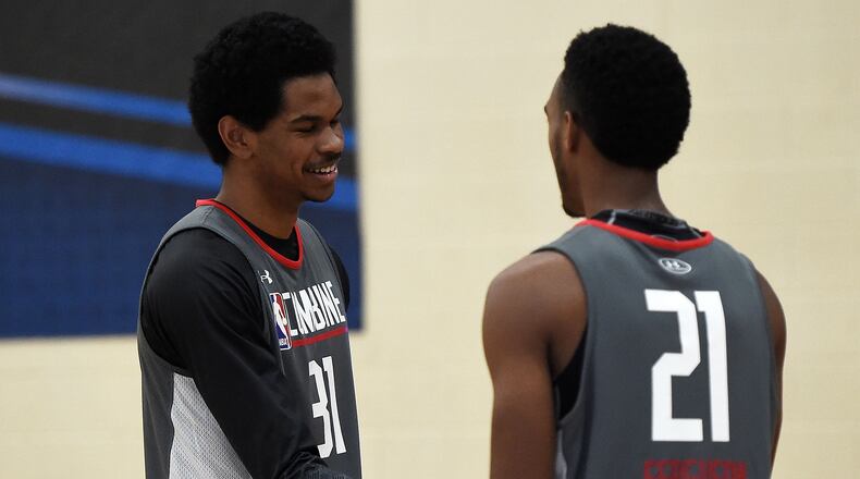 Jarrett Allen (left) speaks with Terrance Ferguson during the NBA Draft Combine at Quest MultiSport Complex on May 12, 2017 in Chicago, Illinois. (Photo by Stacy Revere/Getty Images)