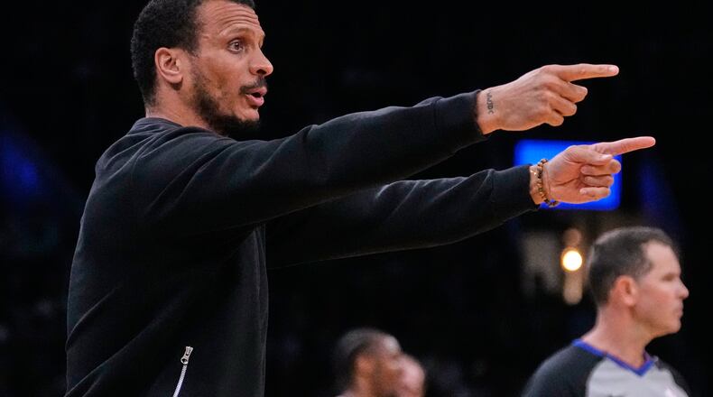 Boston Celtics head coach Joe Mazzulla calls to his players during the first half of Game 5 of a first-round NBA playoffs basketball series against the Philadelphia 76ers, Tuesday, April 28, 2026, in Boston. (AP Photo/Charles Krupa)