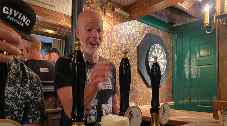 Dave Blanchard pulls a pint of cask-conditioned Bell’s Two Hearted IPA at the new Cask Bar at the Brick Store Pub in Decatur. Bob Townsend for The AJC