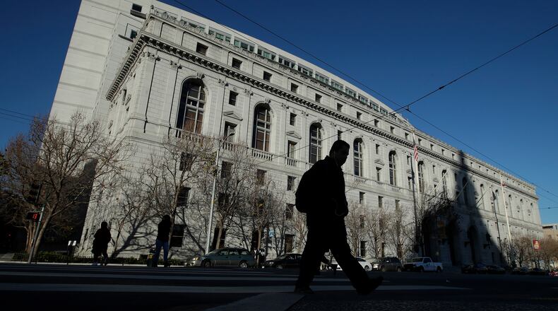 FILE - The Earl Warren Building, headquarters of the Supreme Court of California and part of the Ronald M. George State Office Complex, is shown in San Francisco, Jan. 7, 2020. (AP Photo/Jeff Chiu, File)