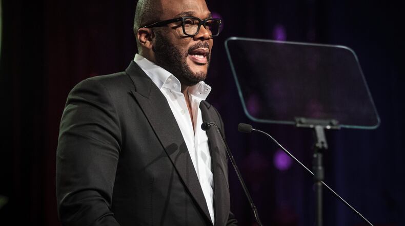 Actor, director and producer Tyler Perry talks to a large crowd gathered for the Candle In The Dark Gala, celebrating the 150th anniversary of Morehouse College in Atlanta on February 18, 2017. STEVE SCHAEFER / SPECIAL TO THE AJC