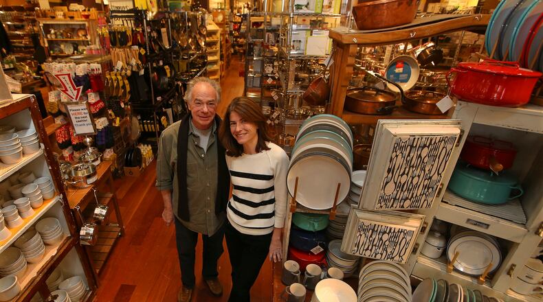 Norman Kornbleuth and his daughter Heather Lamster stand amid his jam-packed store Broadway Panhandler in New York, Jan. 22, 2016. Kornbleuth, 72, says he will be closing the packed-to-the-rafters kitchen store he opened in the SoHo section of Manhattan 40 years ago. He has not set a date yet for the closing.