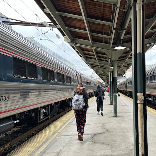 FILE - People walk through Union Station on March 27, 2026, in Washington. (AP Photo/Bill Barrow, File)
