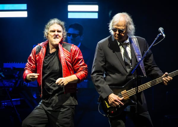 "Weird Al" Yankovic sings "Eat It" (a parody of "Beat It") while donning his Michael Jackson jacket. Yankovic played a stunningly wide array of his humorous songs Sunday night along with matching costume changes and video montages. (Ryan Fleisher for the AJC) 