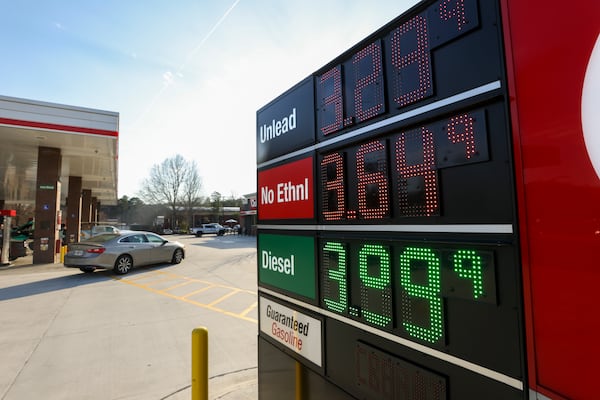Prices are displayed at a gas station in Peachtree Corners on Monday, Mar. 2, 2026. The price per gallon a year earlier was $2.93. (Jason Getz/AJC)