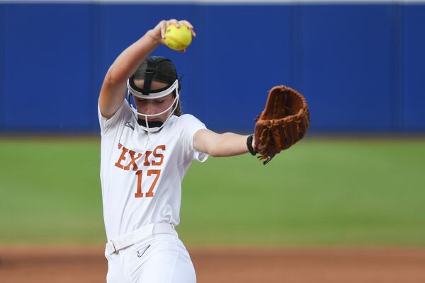 Texas pitcher Teagan Kavan throws during the third game of the NCAA softball Women's College World Series finals agaisnt texas Tech in Oklahoma City, Friday, June 6, 2025. (AP Photo/Kyle Phillips)