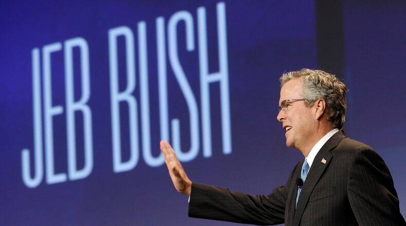Former Florida Gov. Jeb Bush waves while being introduced before speaking at the National Automobile Dealers Association convention in San Francisco, Friday, Jan. 23, 2015. (AP Photo/Jeff Chiu) Former Florida Gov. Jeb Bush waves while being introduced before speaking at the National Automobile Dealers Association convention in San Francisco last Friday. AP/Jeff Chiu