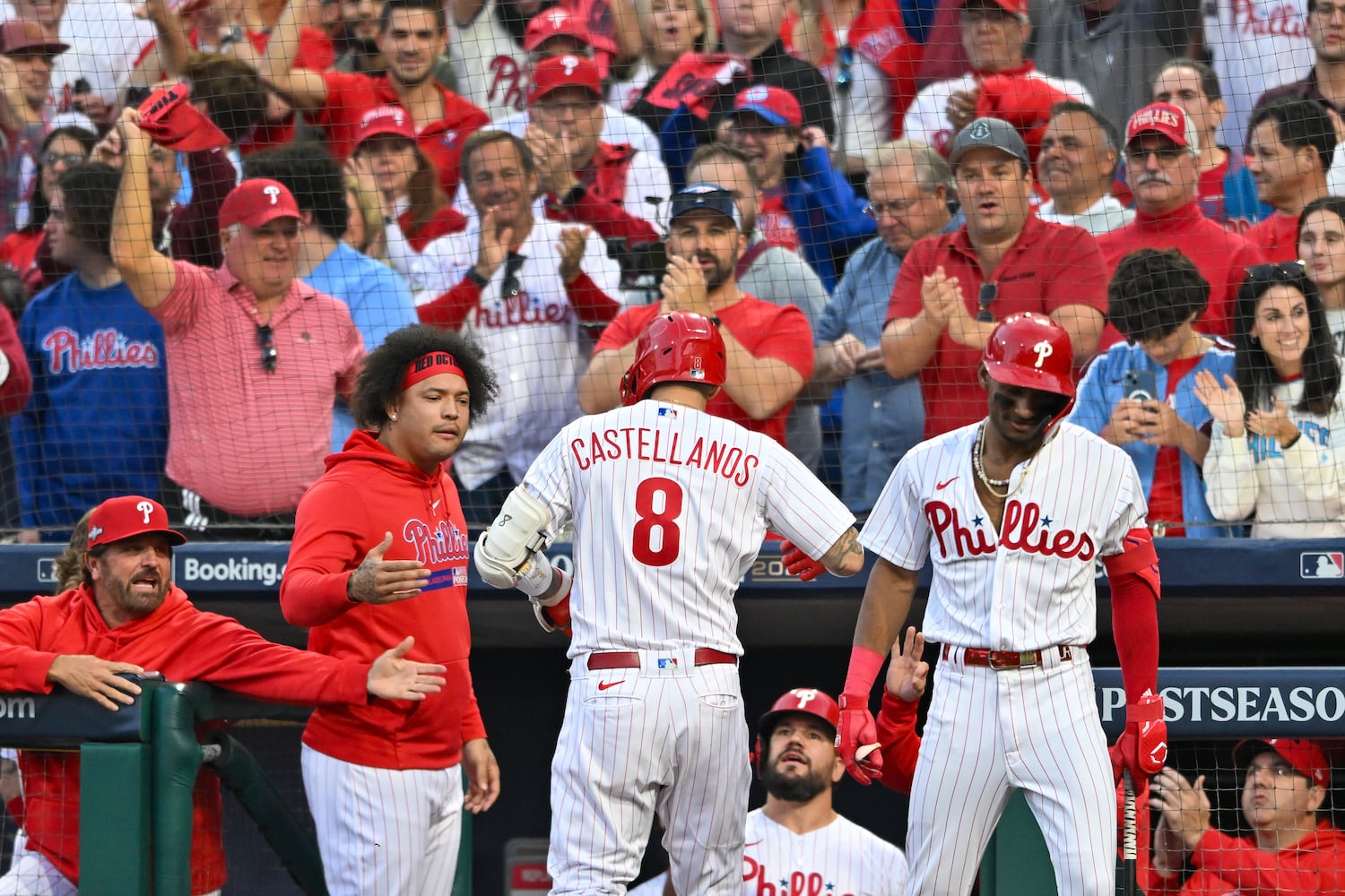 Philadelphia Phillies’ Nick Castellanos (8) celebrates a solo home run against Atlanta Braves starting pitcher Bryce Elder during the third inning of NLDS Game 3 in Philadelphia on Wednesday, Oct. 11, 2023.   (Hyosub Shin / Hyosub.Shin@ajc.com)